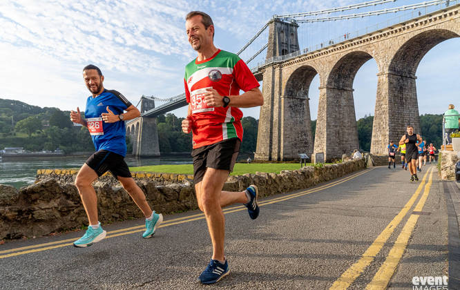 Runners in Menai Bridge on the Anglesey Half Marathon, North Wales