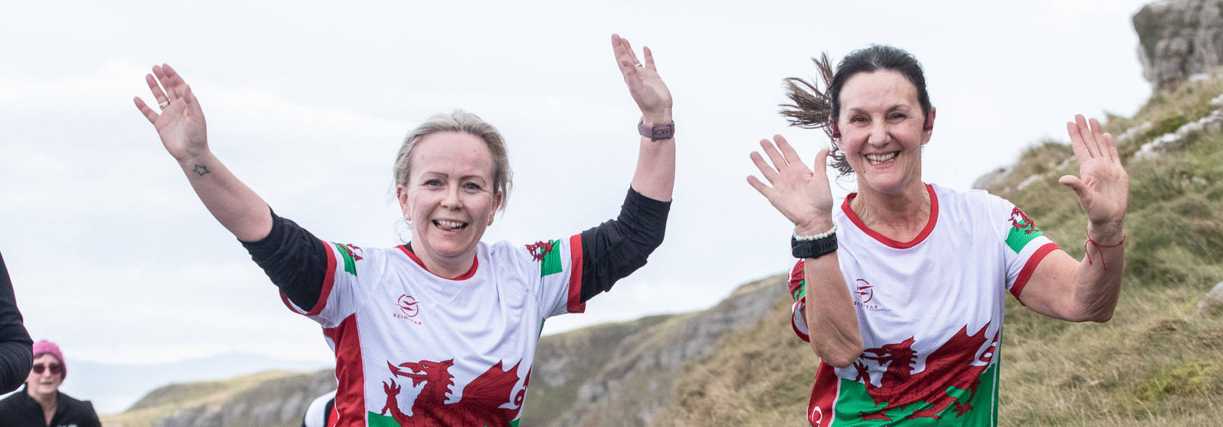 Runners wearing welsh dragons in the Nick Beer 10K Llandudno North Wales