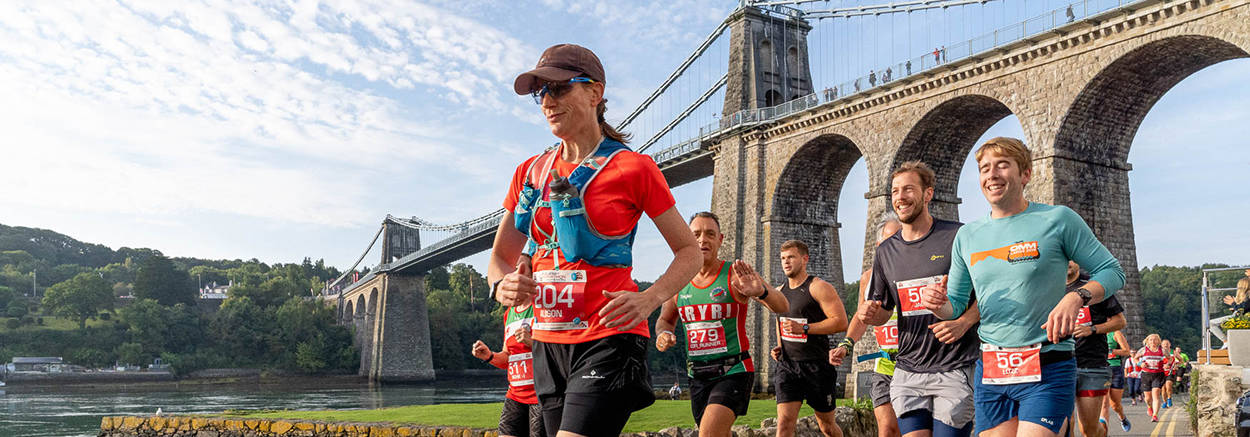 Anglesey Half Matathon runner in Menai Bridge, North Wales