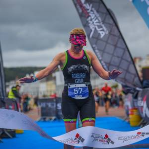 Rhian Roxburgh crossing the finish line at the Llandudno triathlon