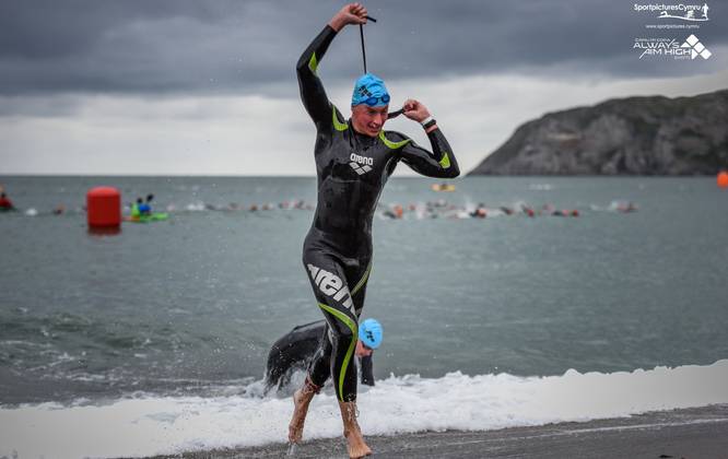 Swimmer leaving the water at the Llandudno Triathlon