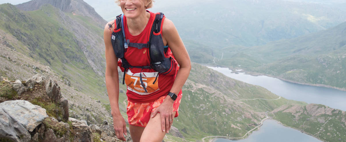 A Snowdonia Ultra Trail Marathon runner on the ascent of Snowdon from Llyn Glaslyn in Wales