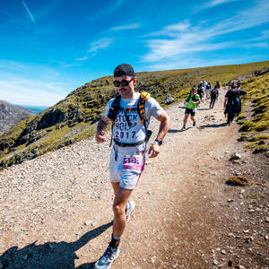Runner in the Snowdonia Ultra Trail Marathon descending Yr Wyddfa (Snowdon)